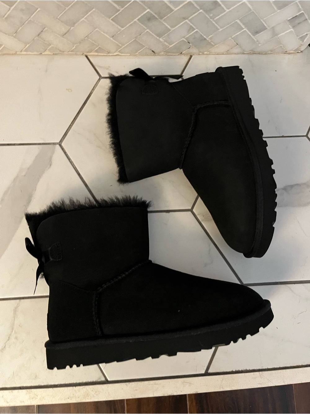 UGG Black Short Shearling Boot. Mini Bailey bow.